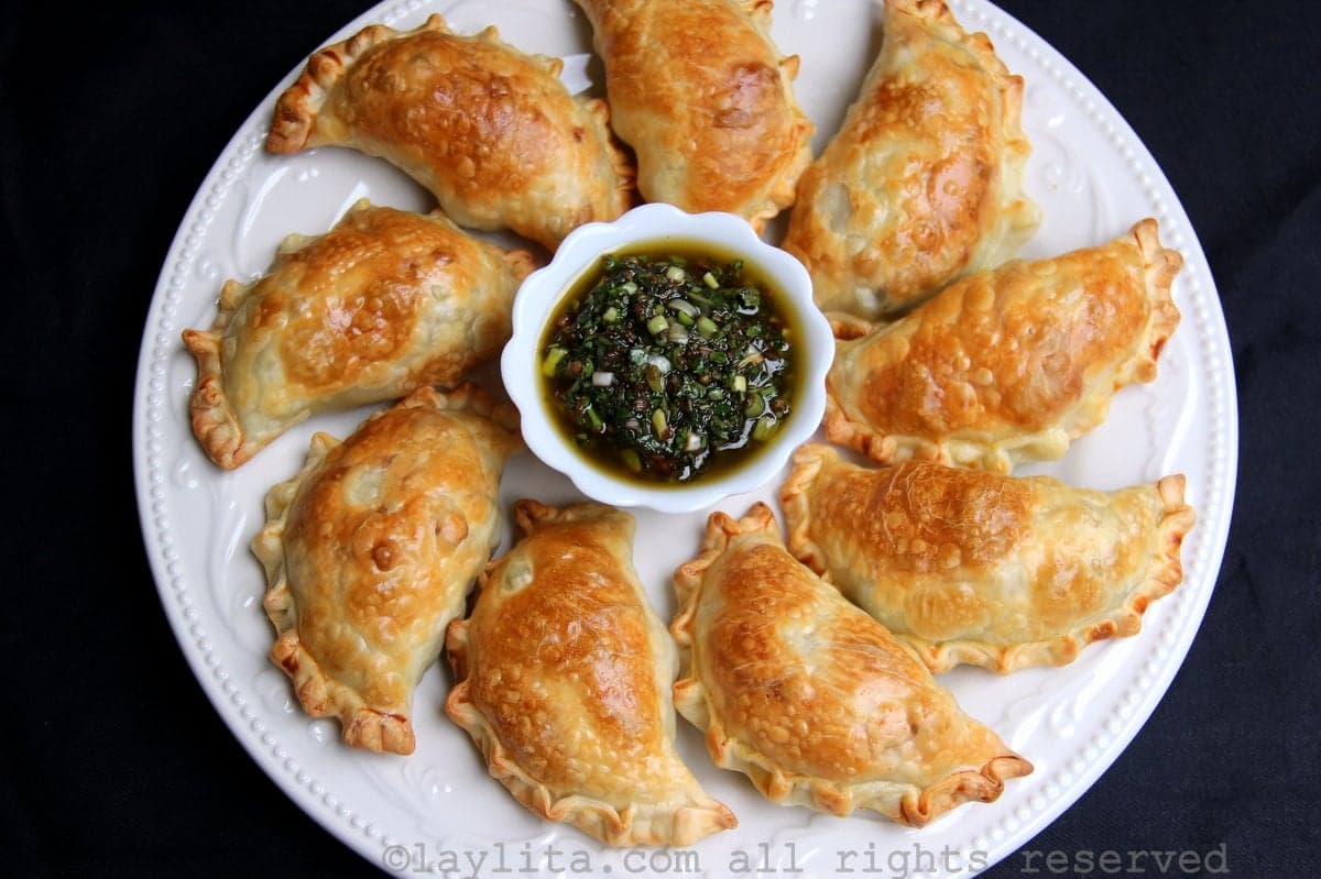 Asparagus empanadas with fava bean, peas and goat cheese